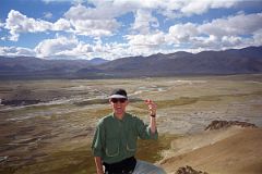 14 Jerome Ryan On Top Of Hill With Tingri And Tingri Plain Behind.jpg